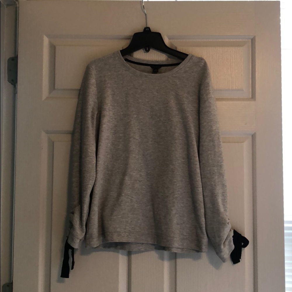 Ann Taylor sweatshirt with bow sleeve detail.
